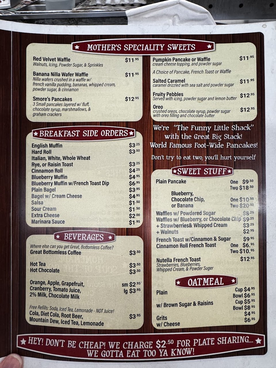 Menu board showing breakfast and lunch options.